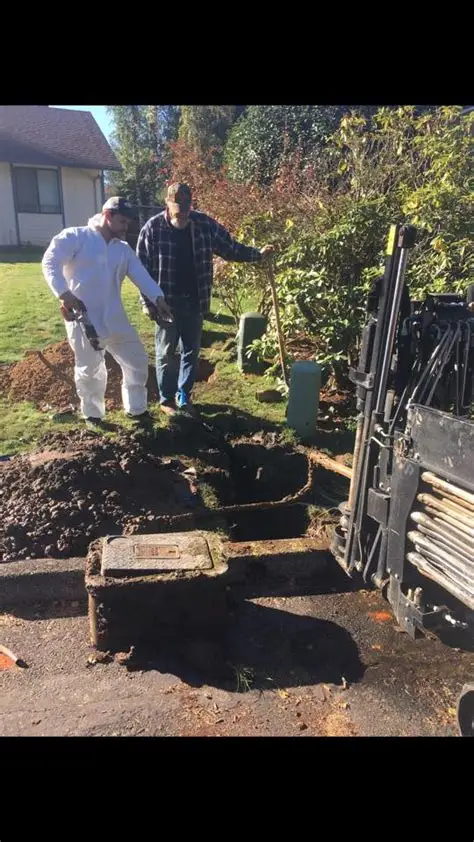 All County crew beside an excavation at an outdoor plumbing job